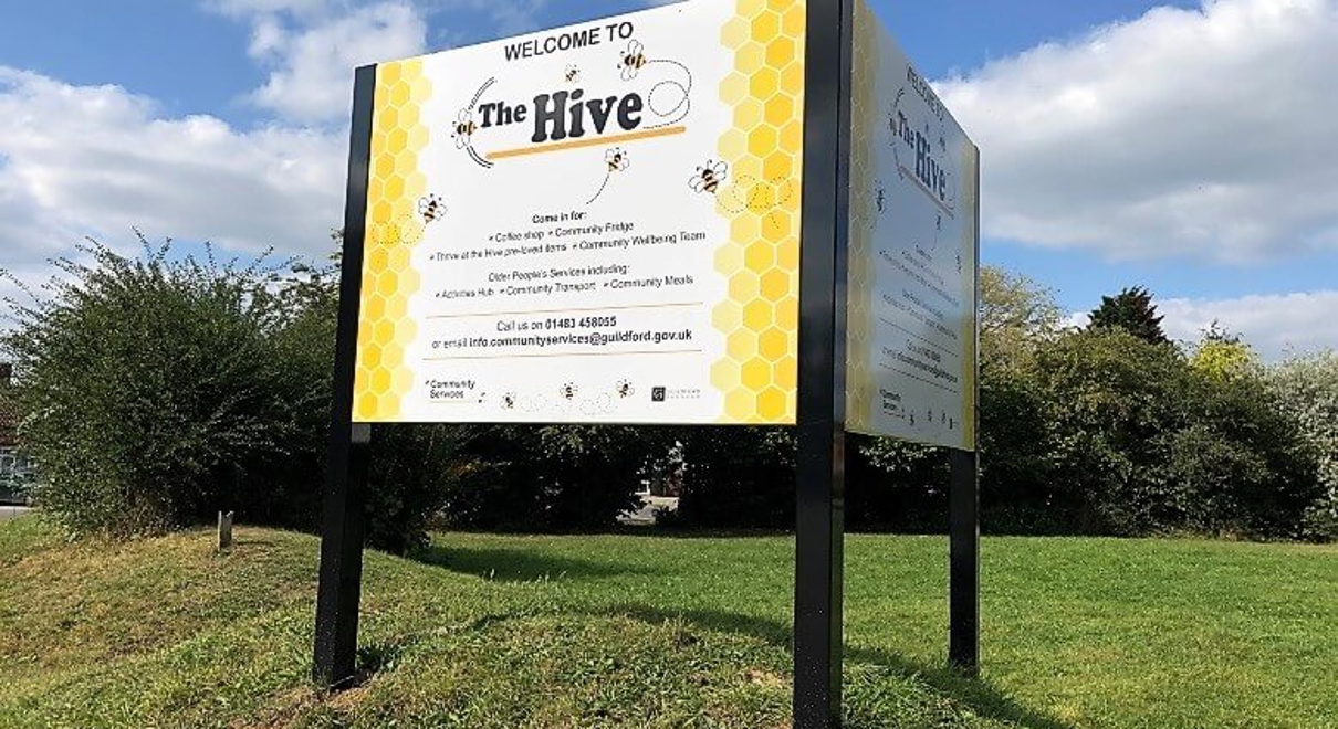 The Hive entrance sign on grass