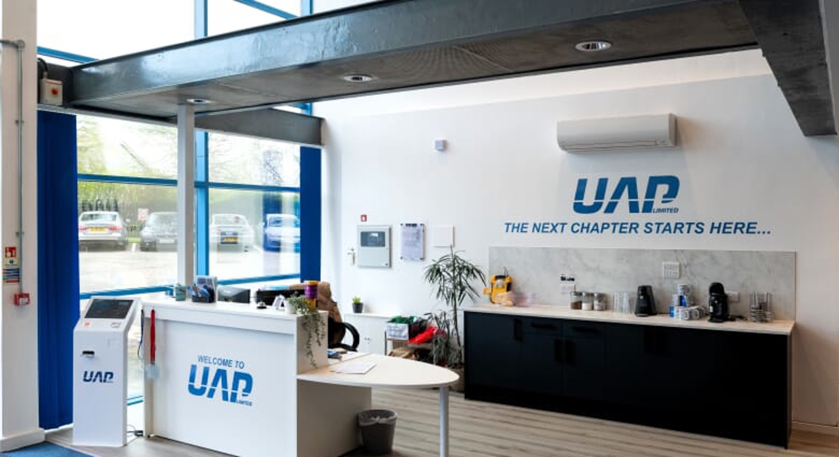 UAP branding on interior walls of the office