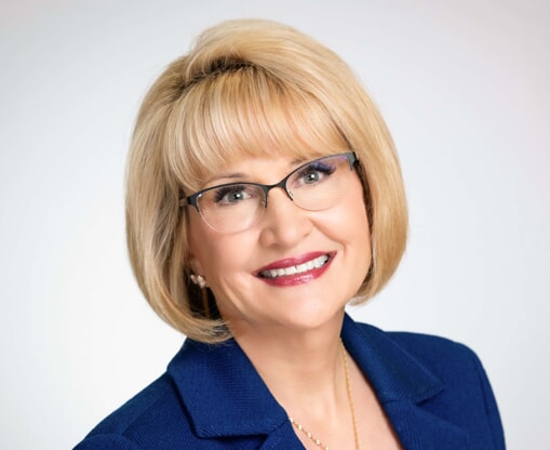 Headshot of Catherine Monson, CFE