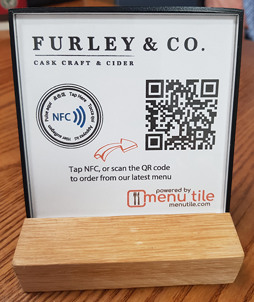 Order and pay with a QR code table sign