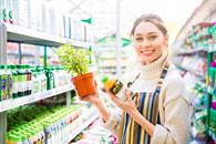 Woman holding a plant