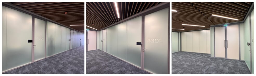 A collage of the vinyl window graphics wrapping around the BBVA meeting rooms and creating privacy.
